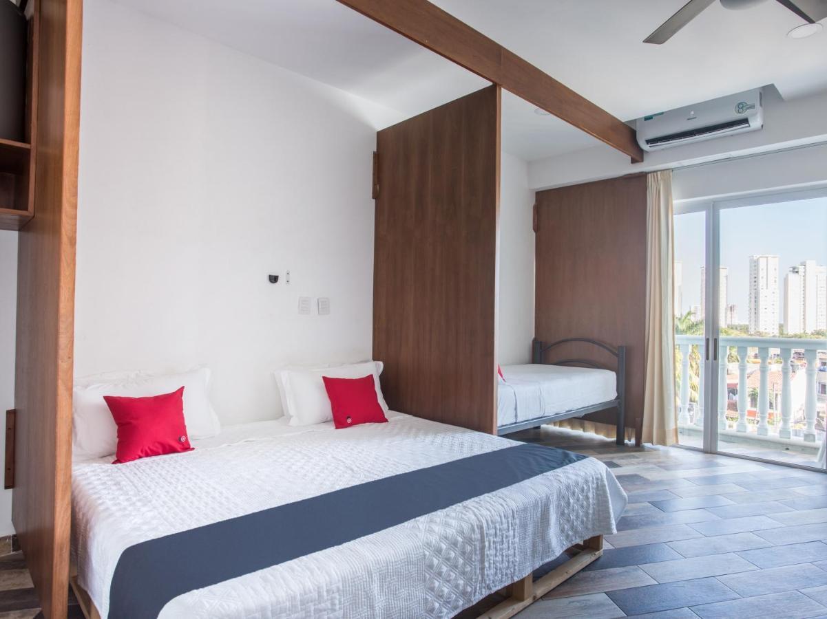 Capital O Cancun Ocean View, Cancun Exterior photo A bedroom at the hotel